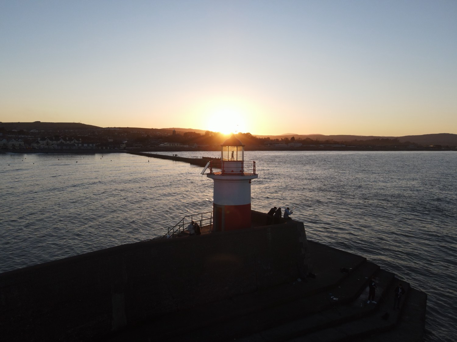 Sunset over Wicklow Harbour lighthouse