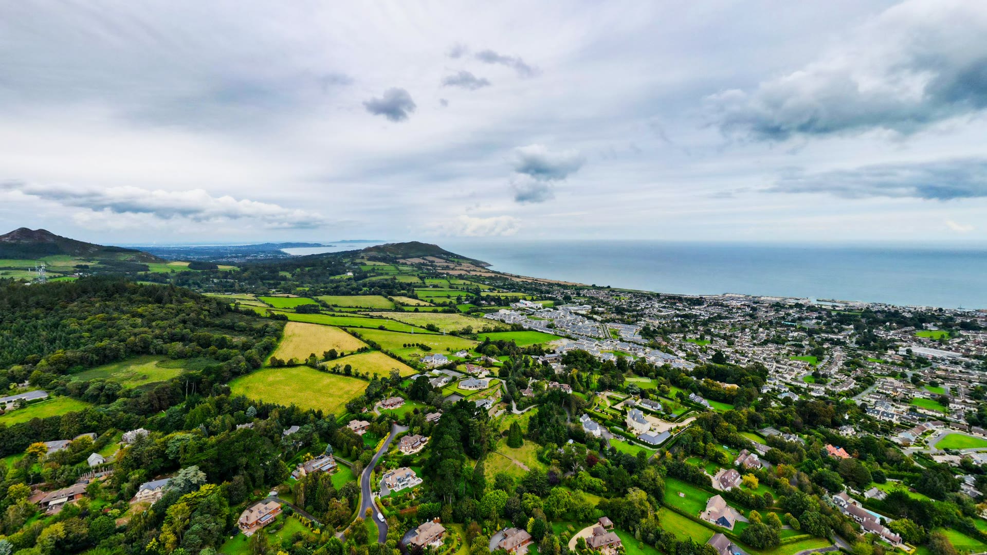 Delgany village nestled in wooded hills with the Irish Sea beyond, County Wicklow — YouIn360 360° virtual tour
