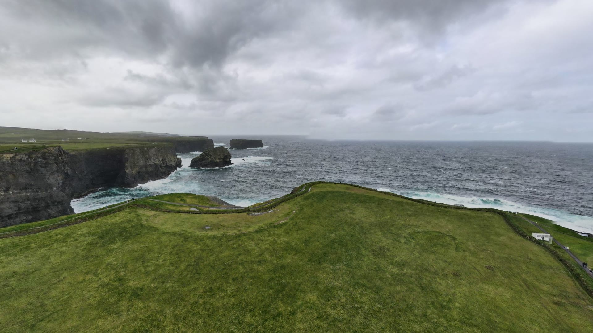 Layered cliffs and Atlantic surf at Kilkee