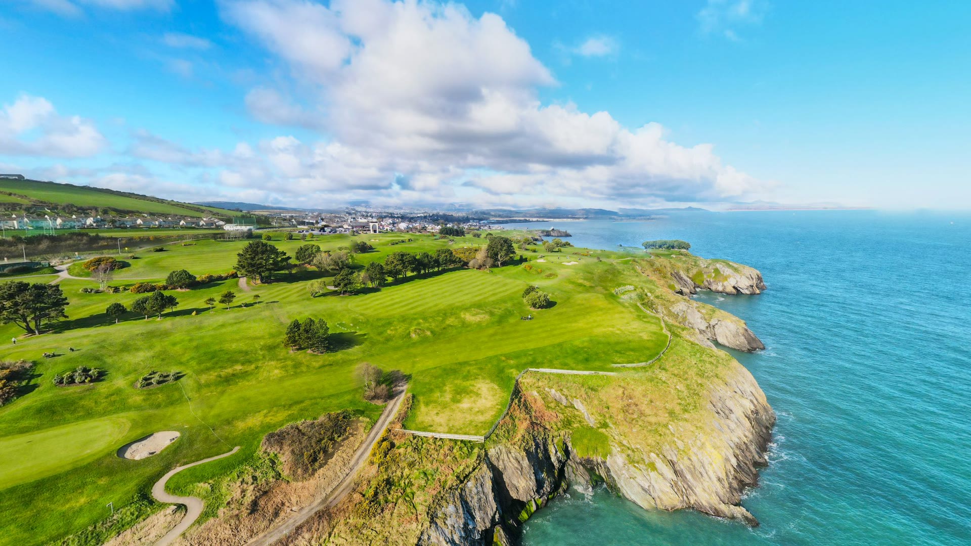 Wicklow Head's green headland and cliffs meeting the Irish Sea, County Wicklow — YouIn360 360° virtual tour